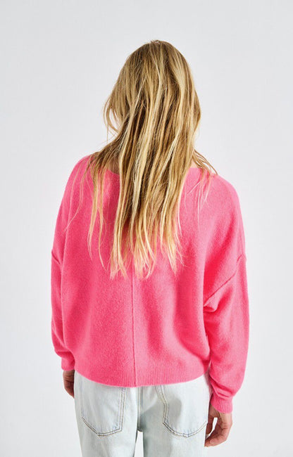 Pull manches longues rose fluo